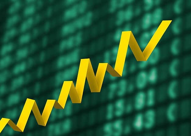 yellow arrow pointing upwards, representing a positive trend or growth.